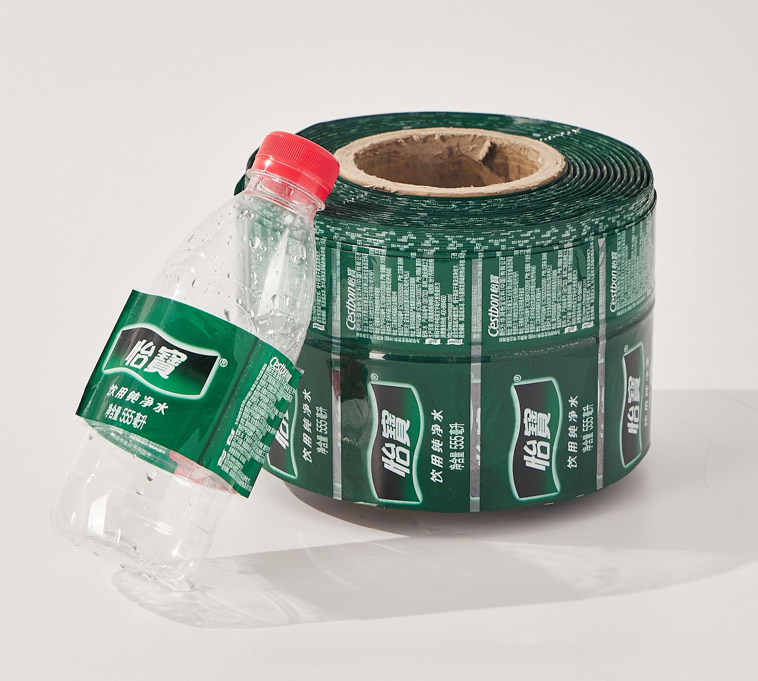 Printed Water Bottle Shrinkable Sleeve Label PET Plastic Film Plastic Shrink Wrap Sleeve Juice Bottle