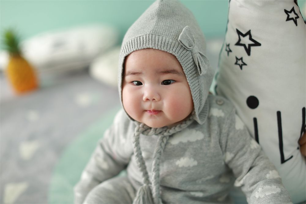 Children's winter warm hats Baby girls ear caps Baby wool hats bow hats