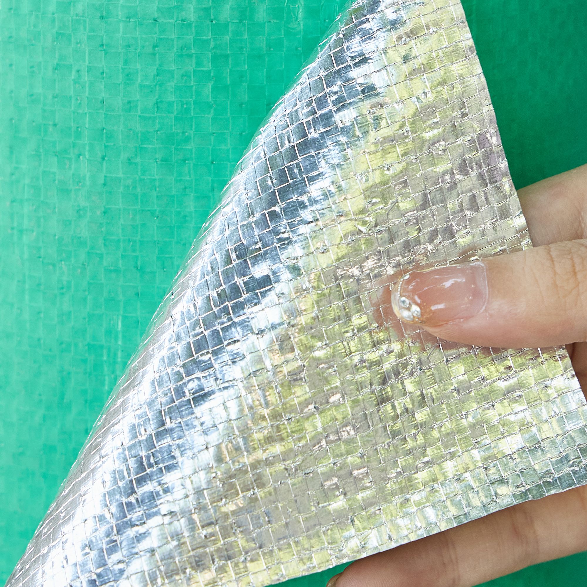 Green woven fabric and aluminum foil sharking