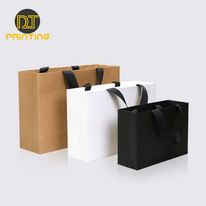 Wholesale Luxury Kraft Paper Packaging Bags Personalized Shopping Boutique Paper Bags for Clothing