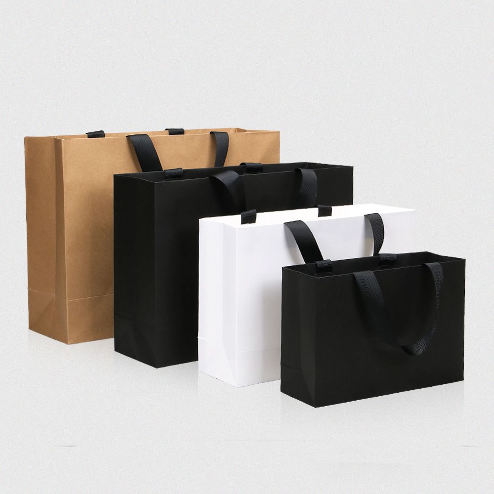 Wholesale Luxury Kraft Paper Packaging Bags Personalized Shopping Boutique Paper Bags for Clothing