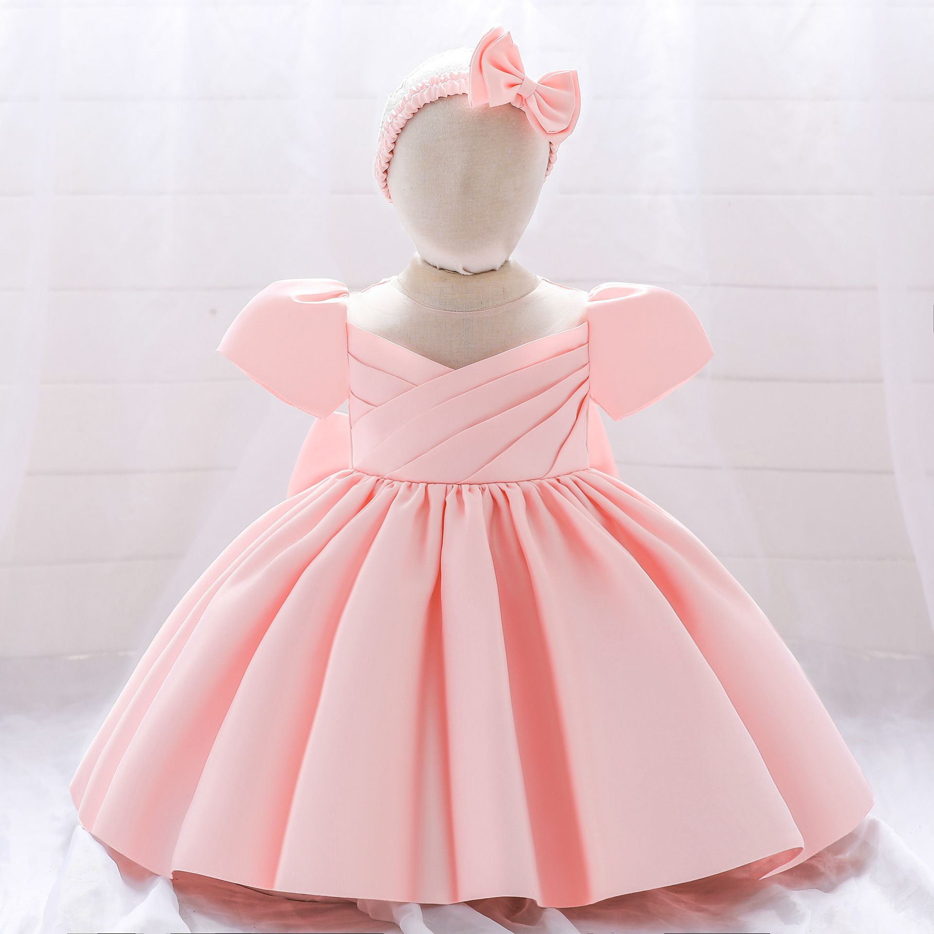 Elegant solid color dress for baby girls with puffy sleeves and matching headband - perfect for birthdays and special occasions