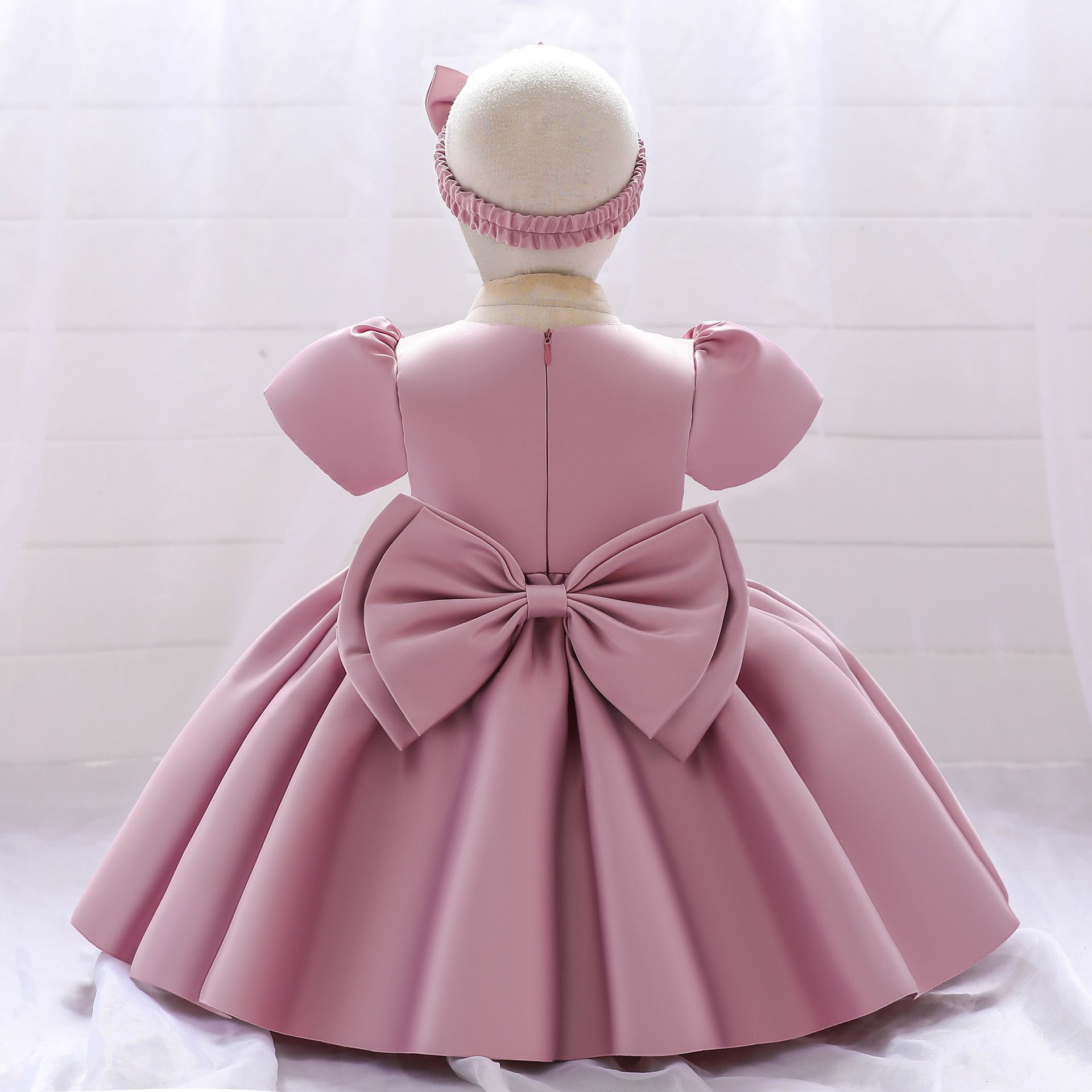 Elegant solid color dress for baby girls with puffy sleeves and matching headband - perfect for birthdays and special occasions