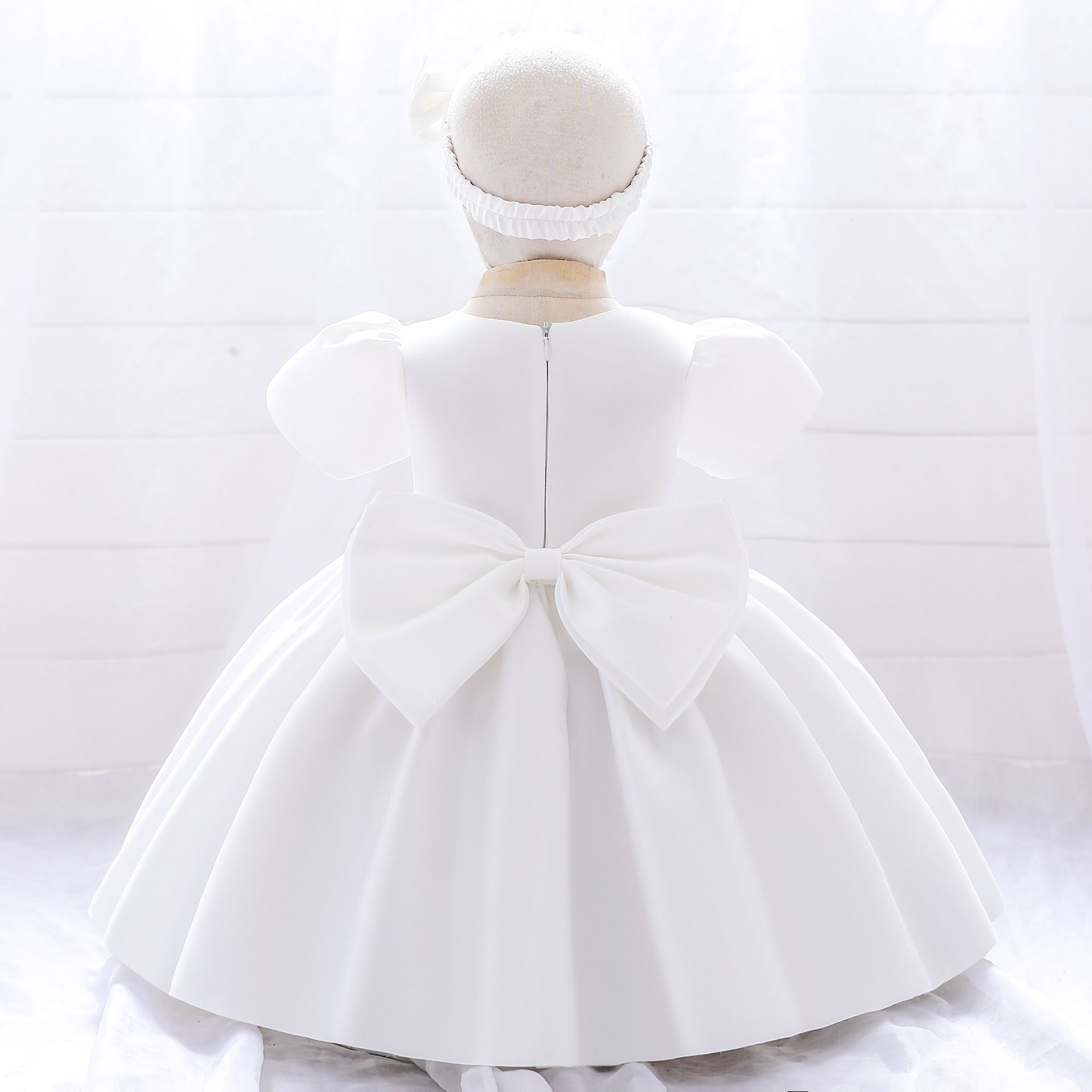 Elegant solid color dress for baby girls with puffy sleeves and matching headband - perfect for birthdays and special occasions