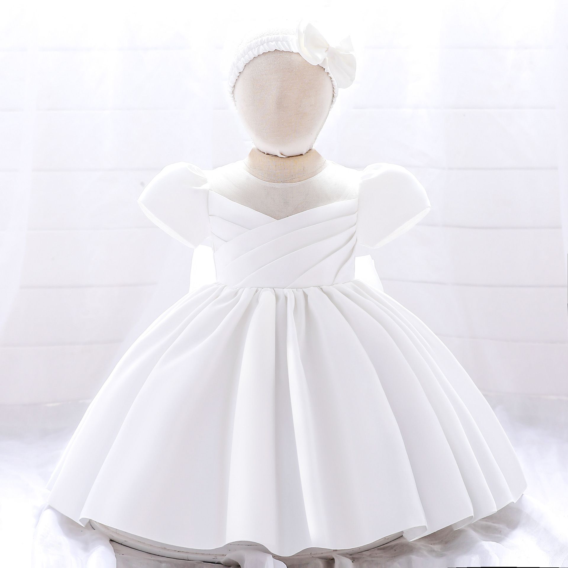 Elegant solid color dress for baby girls with puffy sleeves and matching headband - perfect for birthdays and special occasions