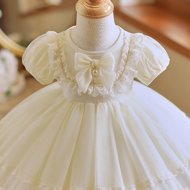 Adorable White Princess Dress for Girls with Puffy Sleeves, Lace Trim, and Bow Accent - Perfect for Birthdays, Parties, and For