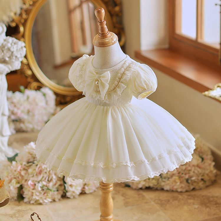 Adorable White Princess Dress for Girls with Puffy Sleeves, Lace Trim, and Bow Accent - Perfect for Birthdays, Parties, and For