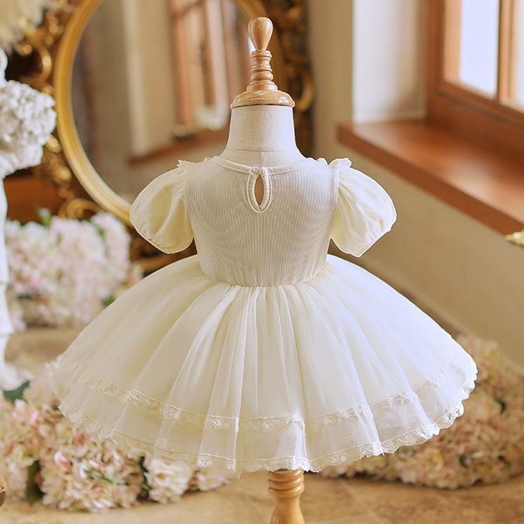 Adorable White Princess Dress for Girls with Puffy Sleeves, Lace Trim, and Bow Accent - Perfect for Birthdays, Parties, and For