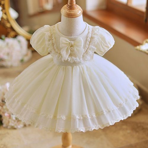 Adorable White Princess Dress for Girls with Puffy Sleeves, Lace Trim, and Bow Accent - Perfect for Birthdays, Parties, and For