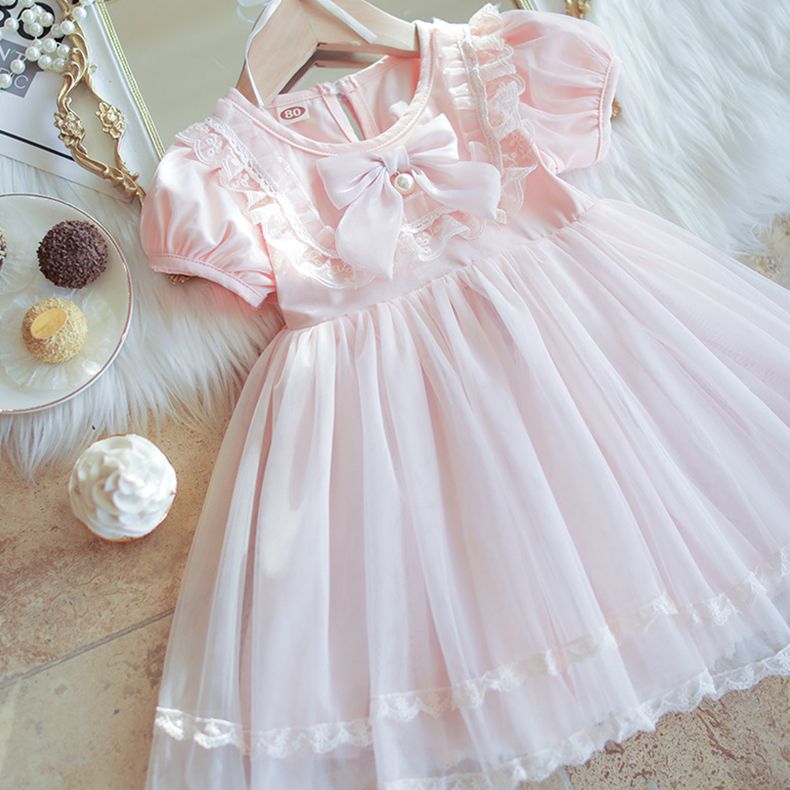 Adorable Pink Princess Dress for Girls with Puffy Sleeves, Lace Trim, and Bow Accent - Perfect for Birthdays, Parties, and Forma