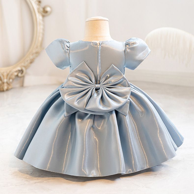 Elegant girls' satin princess tutu with puffy sleeves and bow, perfect for birthday parties, flower girls and performances