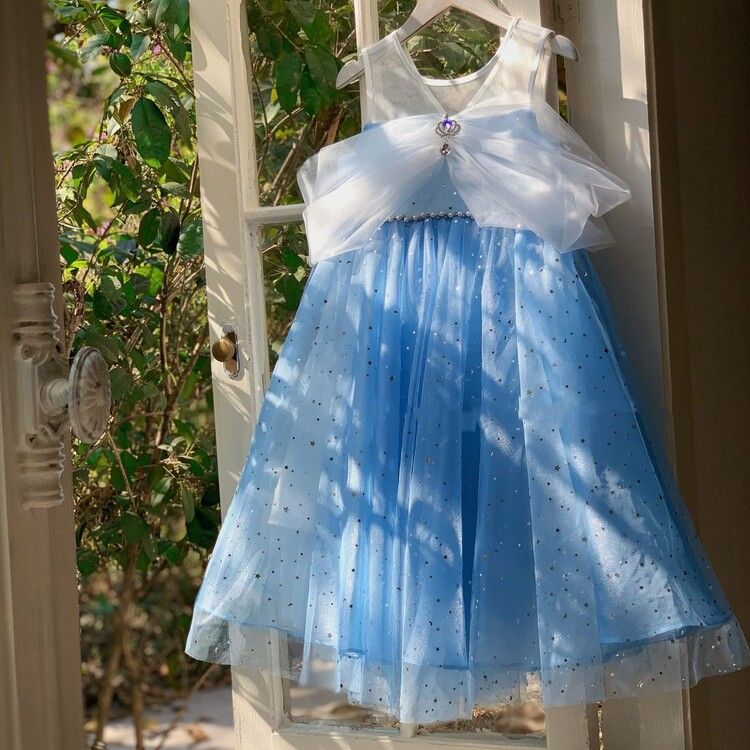 Girls' sparkly tulle kids dress with star sequin overlay and elegant cape sleeves - perfect for parties and special events