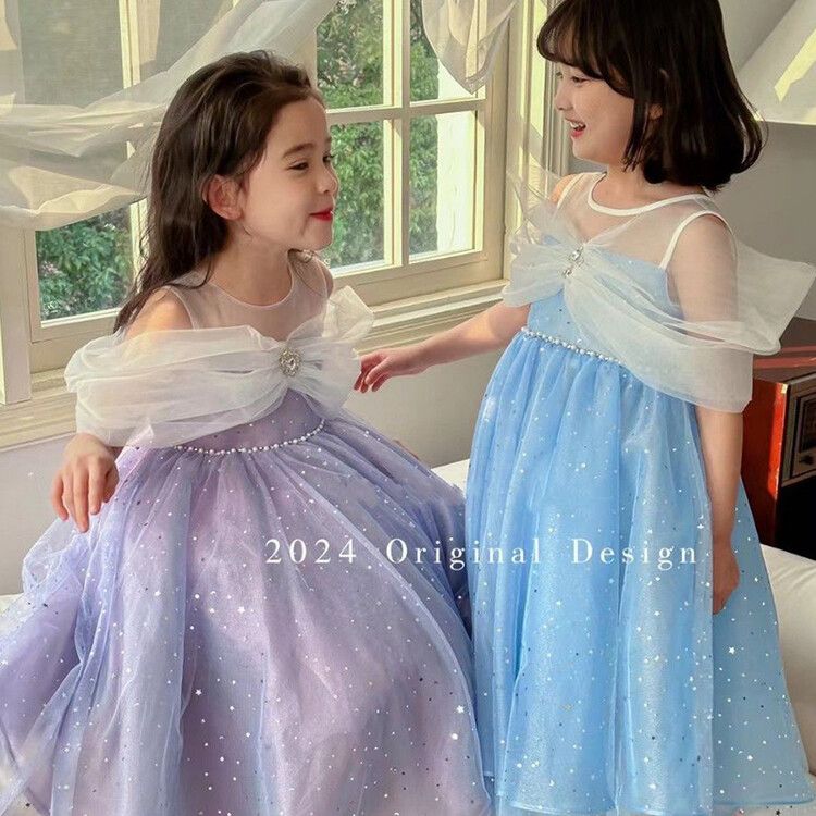 Girls' sparkly tulle kids dress with star sequin overlay and elegant cape sleeves - perfect for parties and special events