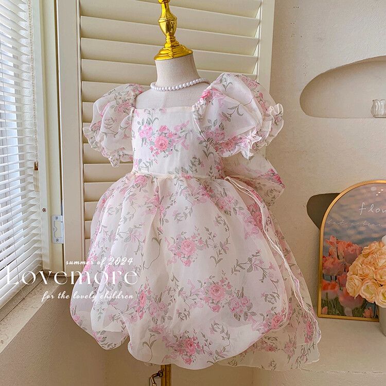 Cute girls floral puff sleeve kids dress with elegant bow and pearl detail - perfect for parties and birthdays