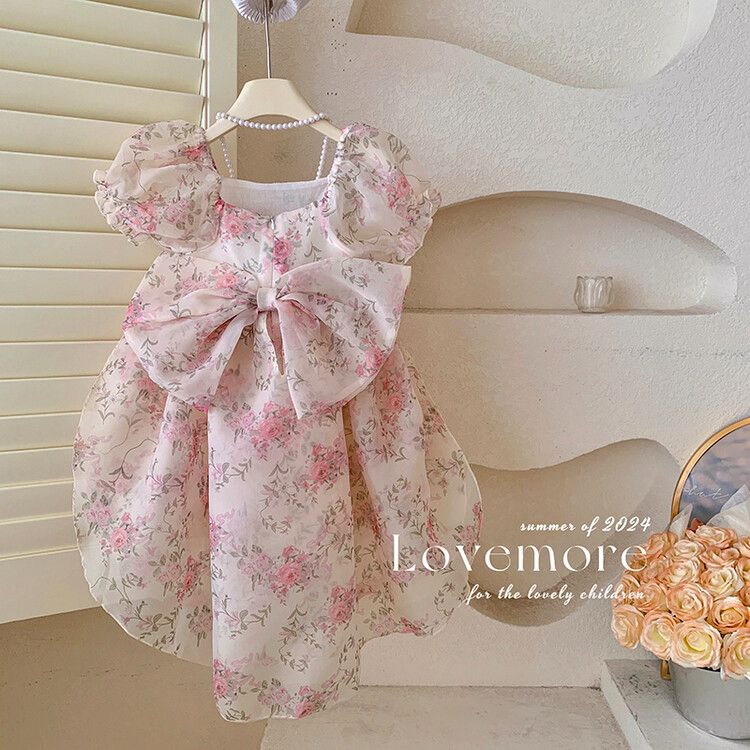 Cute girls floral puff sleeve kids dress with elegant bow and pearl detail - perfect for parties and birthdays