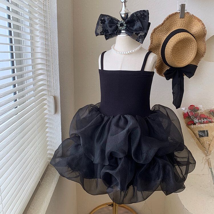 Chic girls' black and white tulle children's dress with tiered skirt and elegant spaghetti straps - perfect for formal events