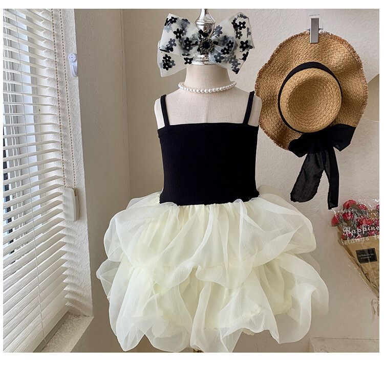 Chic girls' black and white tulle children's dress with tiered skirt and elegant spaghetti straps - perfect for formal events