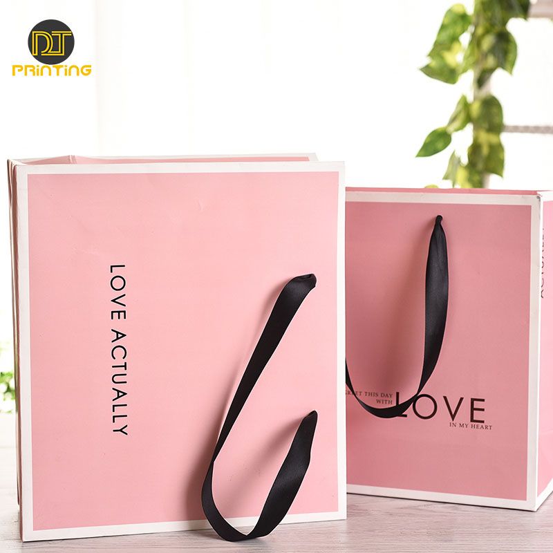 Women Pink Paper luxury Hot Selling Packaging Shopping Clothing Paper Gift Bag With Ribbon