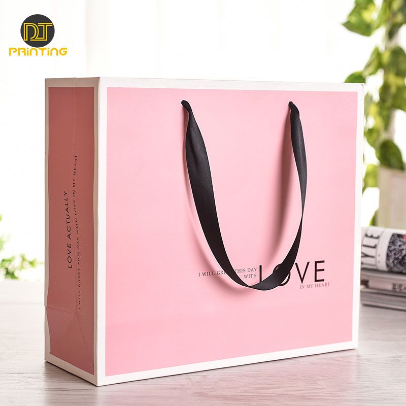 Women Pink Paper luxury Hot Selling Packaging Shopping Clothing Paper Gift Bag With Ribbon