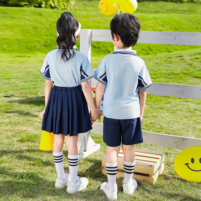 Primary school students in summer pure cotton stripes matching badge school uniforms fresh