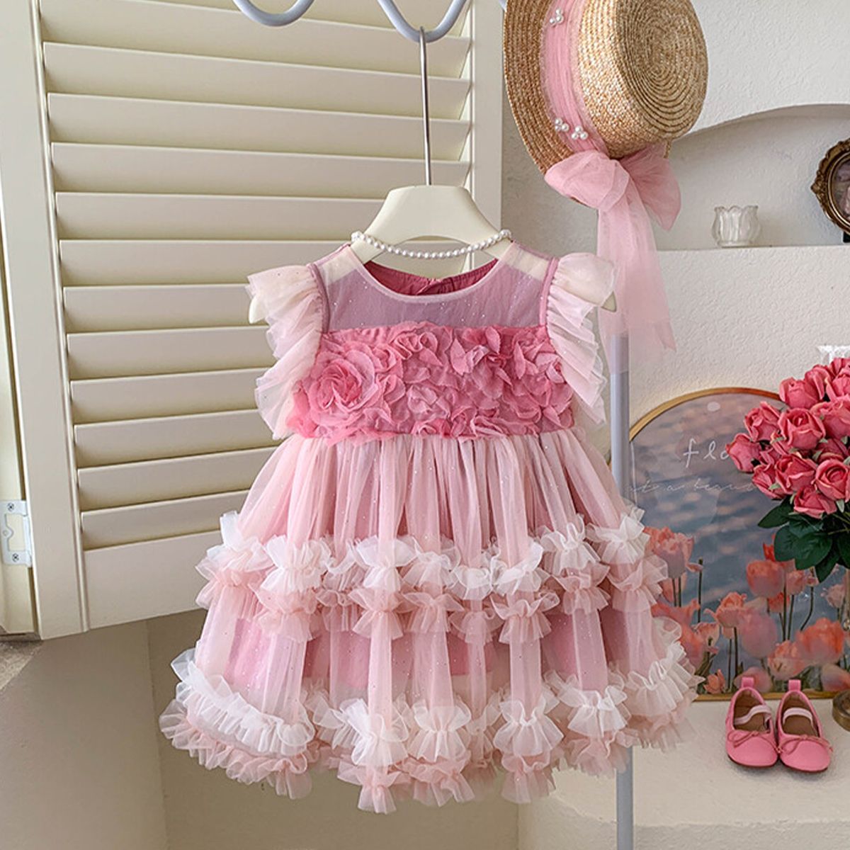 Elegant Pink Layered Tulle Kids Dress with Floral Accents and Ruffled Sleeves for Perfect for Special Occasions