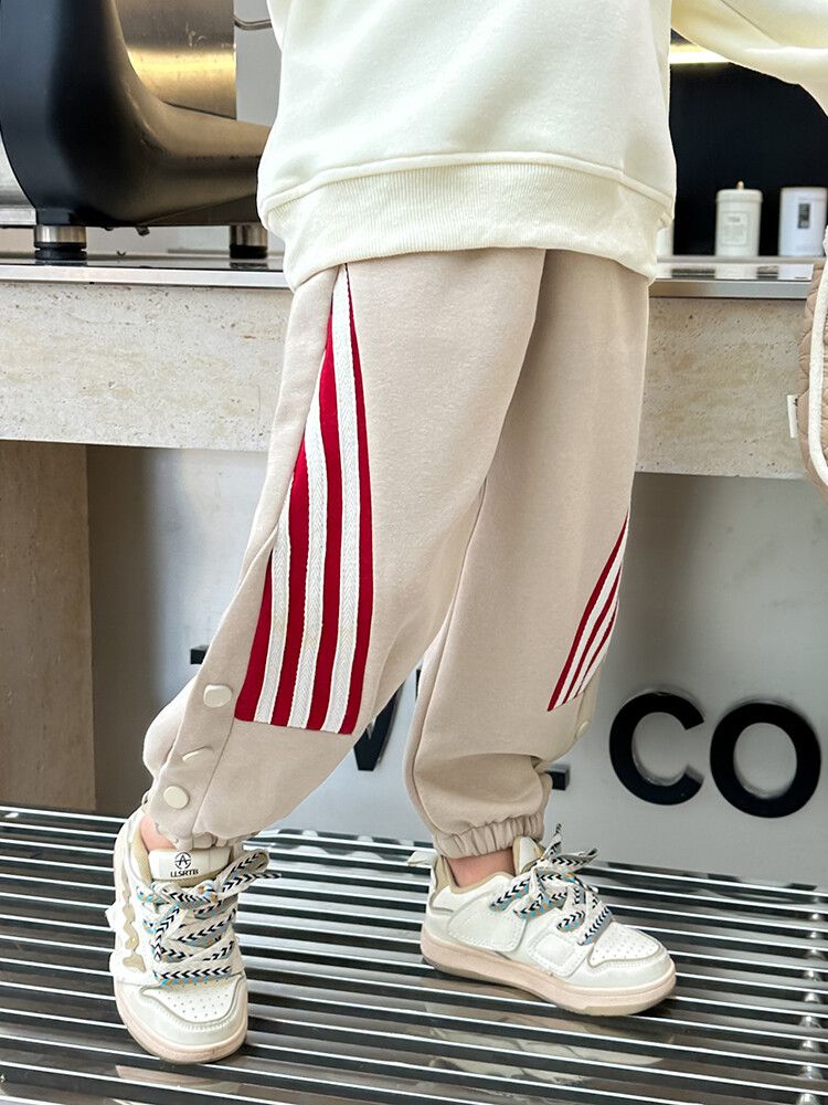 Girls' Beige Jogger Pants with Red Striped Panels and Buttoned Cuffs - Casual Activewear Trousers for Kids