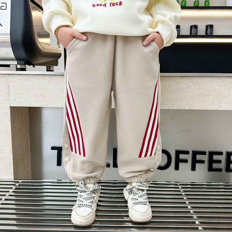 Girls' Beige Jogger Pants with Red Striped Panels and Buttoned Cuffs - Casual Activewear Trousers for Kids