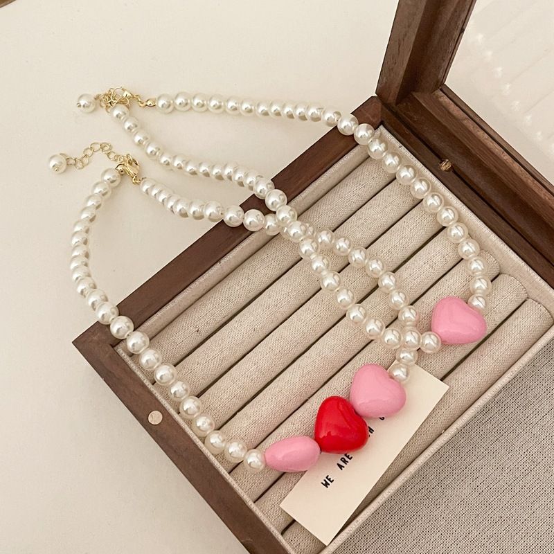 New elegant pearl necklace clavicle chain, love charm