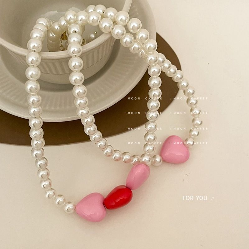 New elegant pearl necklace clavicle chain, love charm