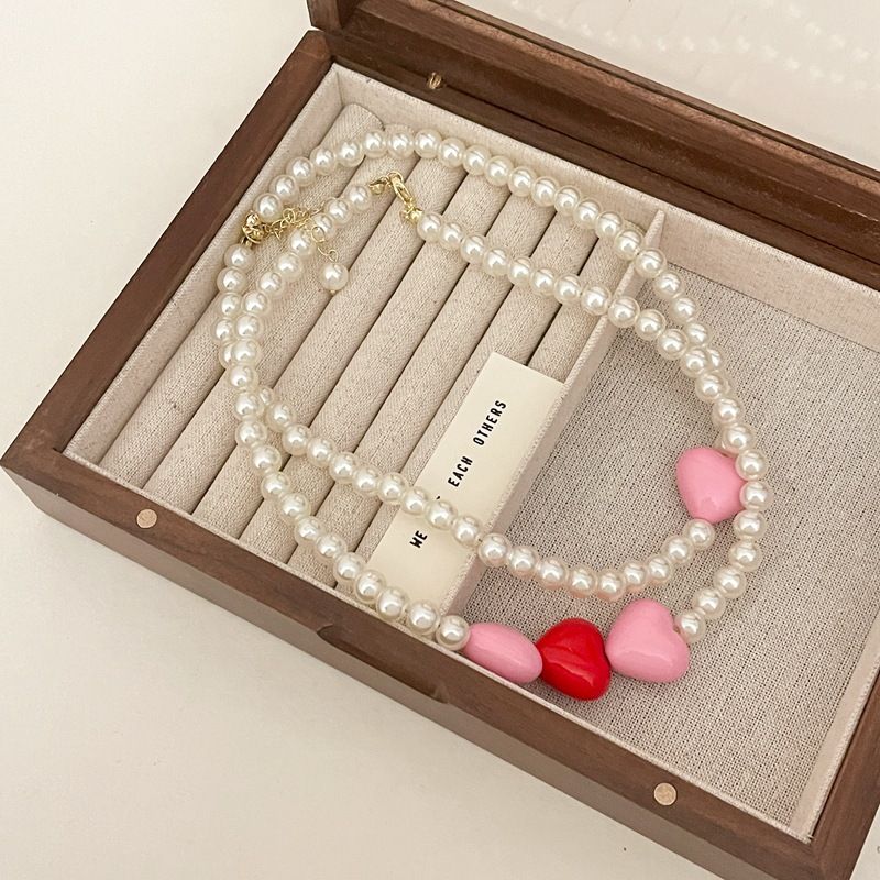 New elegant pearl necklace clavicle chain, love charm