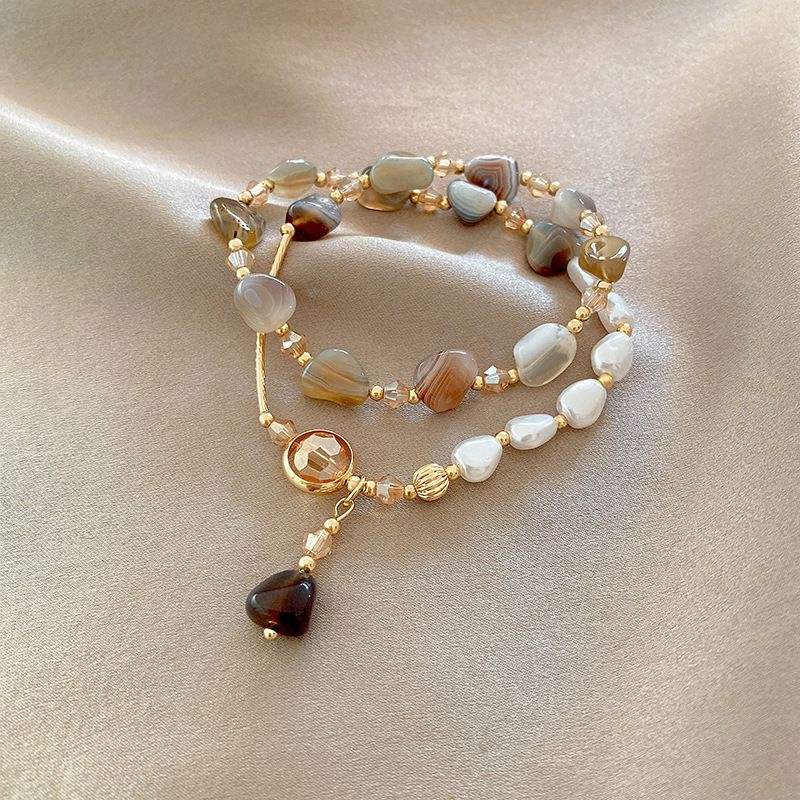 Double-layered imitation natural stone pearl bracelet for women, delicate design, light luxury girlfriend and versatile hand orn