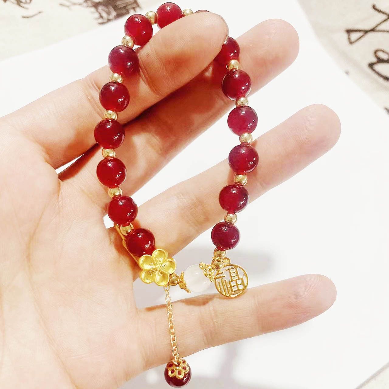 Red beans send acacia new imitation red agate plum blossom bracelet girlfriend bracelet female niche design sense beaded acacia