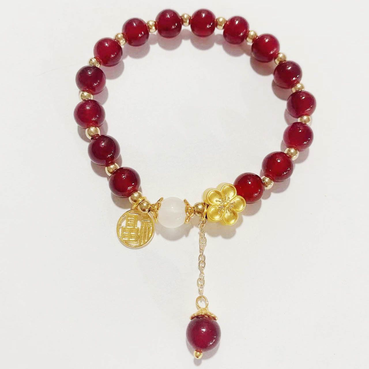 Red beans send acacia new imitation red agate plum blossom bracelet girlfriend bracelet female niche design sense beaded acacia