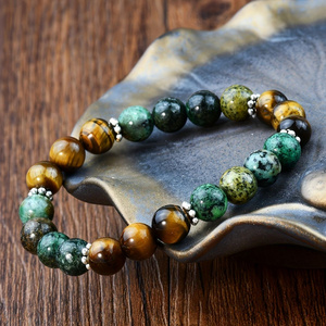 Tiger's eye and African turquoise beaded bracelets for both men and women, as well as courage-enhancing jewelry, stretchable bra