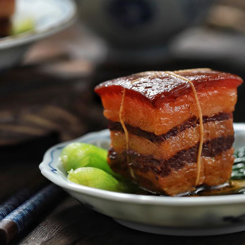 dongpo pork Chinese characteristics Hangzhou delicious open the bag to eat