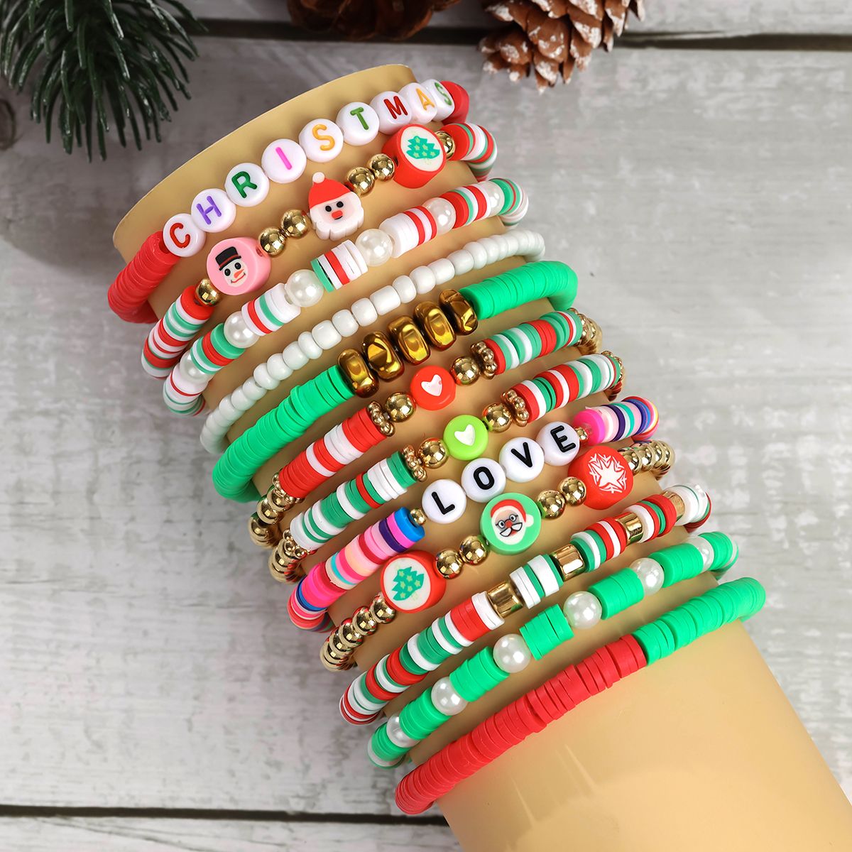 12 pieces Christmas soft ceramic zinc alloy snowman heart letter handmade beads elastic adjustable fashion bracelet set