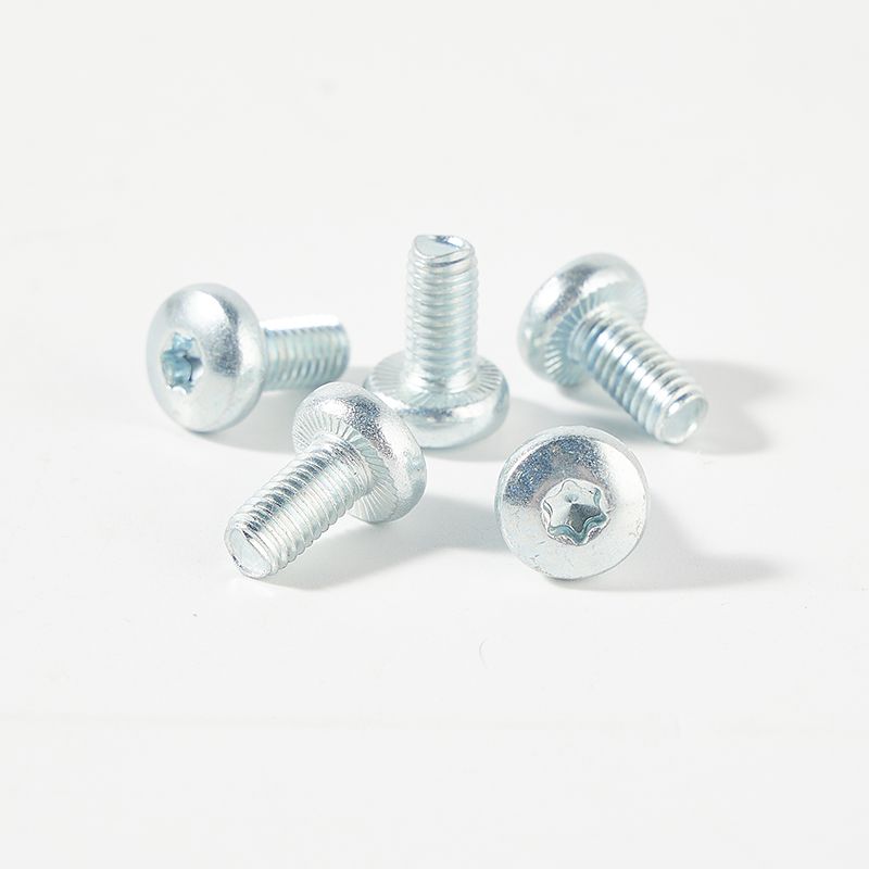 Pan head torx drive machine screw with serration