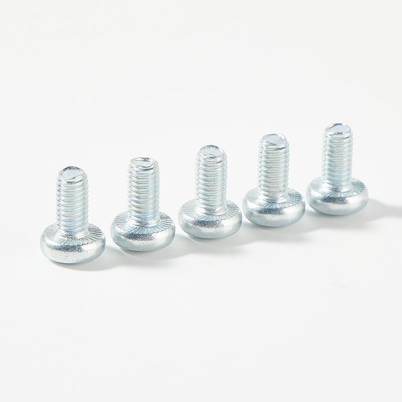 Pan head torx drive machine screw with serration