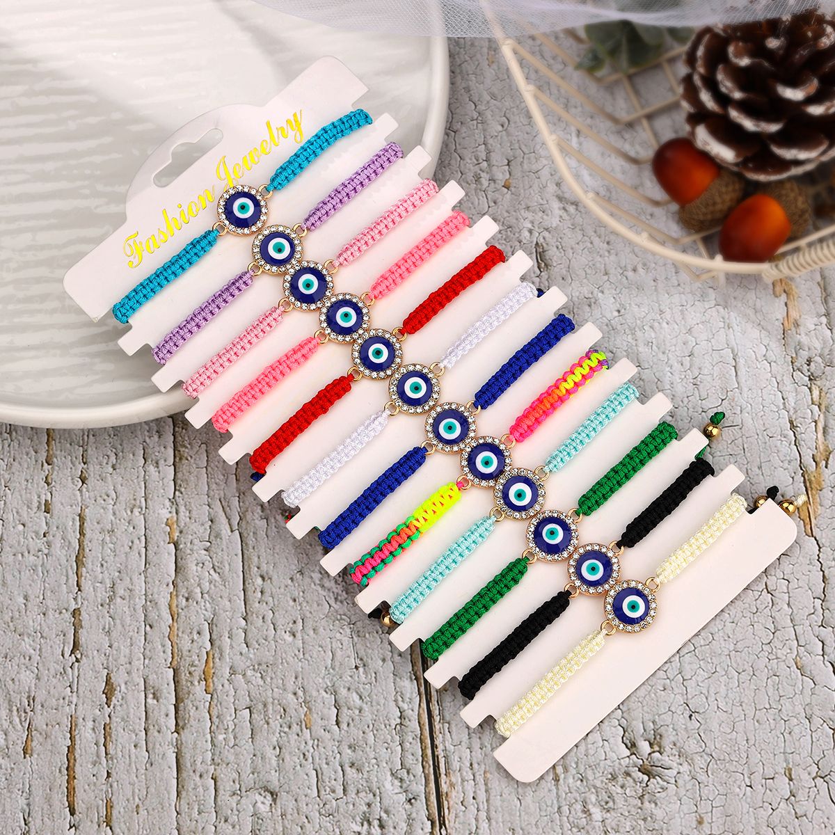 12 pieces braided rope zinc alloy diamond studded eyes hand woven adjustable fashionable bracelet set