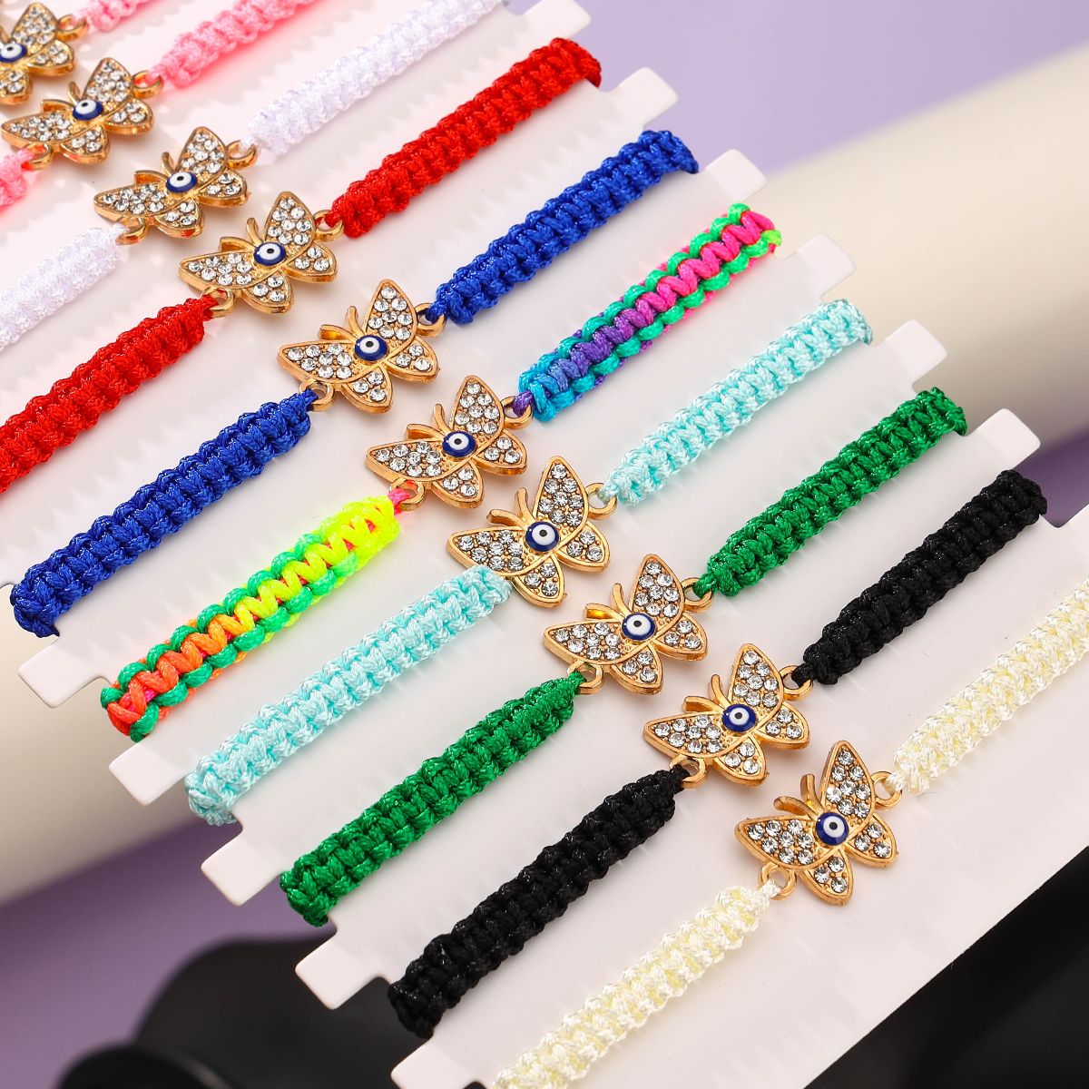 12 pieces woven rope zinc alloy diamond inlaid butterfly eye hand woven adjustable fashionable bracelet set