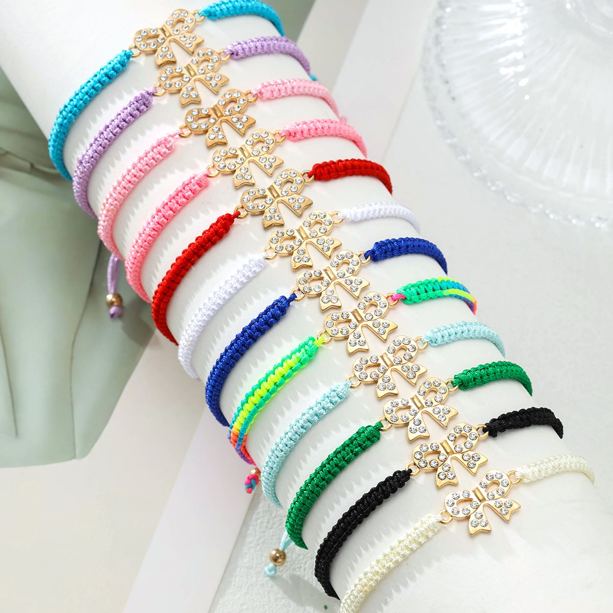 12 pieces braided rope zinc alloy diamond studded bow handmade adjustable fashion bracelet set