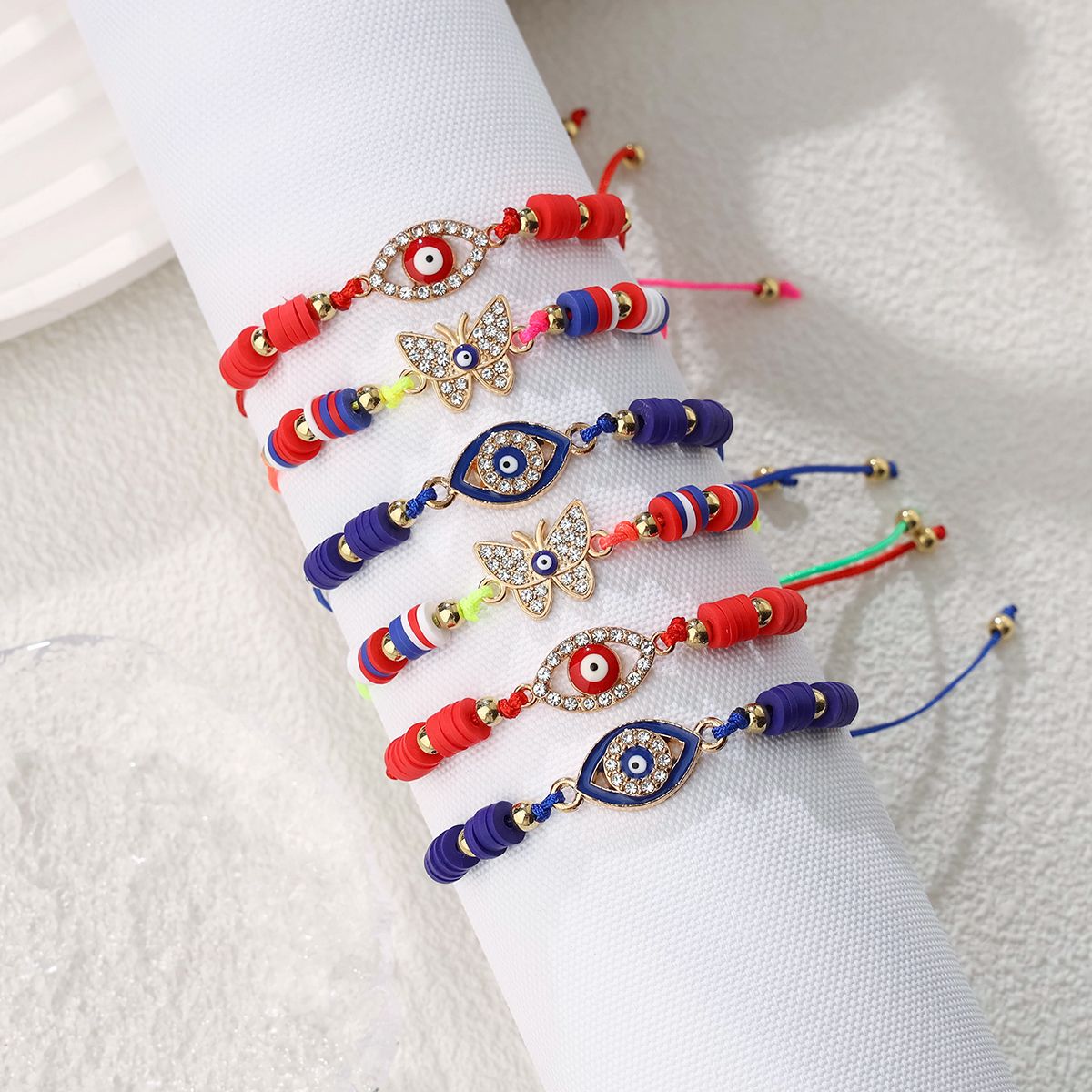 6 pieces woven rope soft ceramic zinc alloy butterfly eye hand woven adjustable fashionable bracelet set