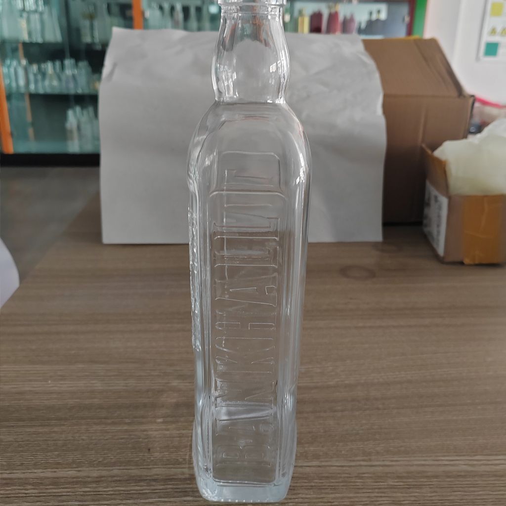 Wholesale price 100ml 250ml 350ml 500ml 700ml Custom Logo Wine Spirit Liquids Glass Bottle