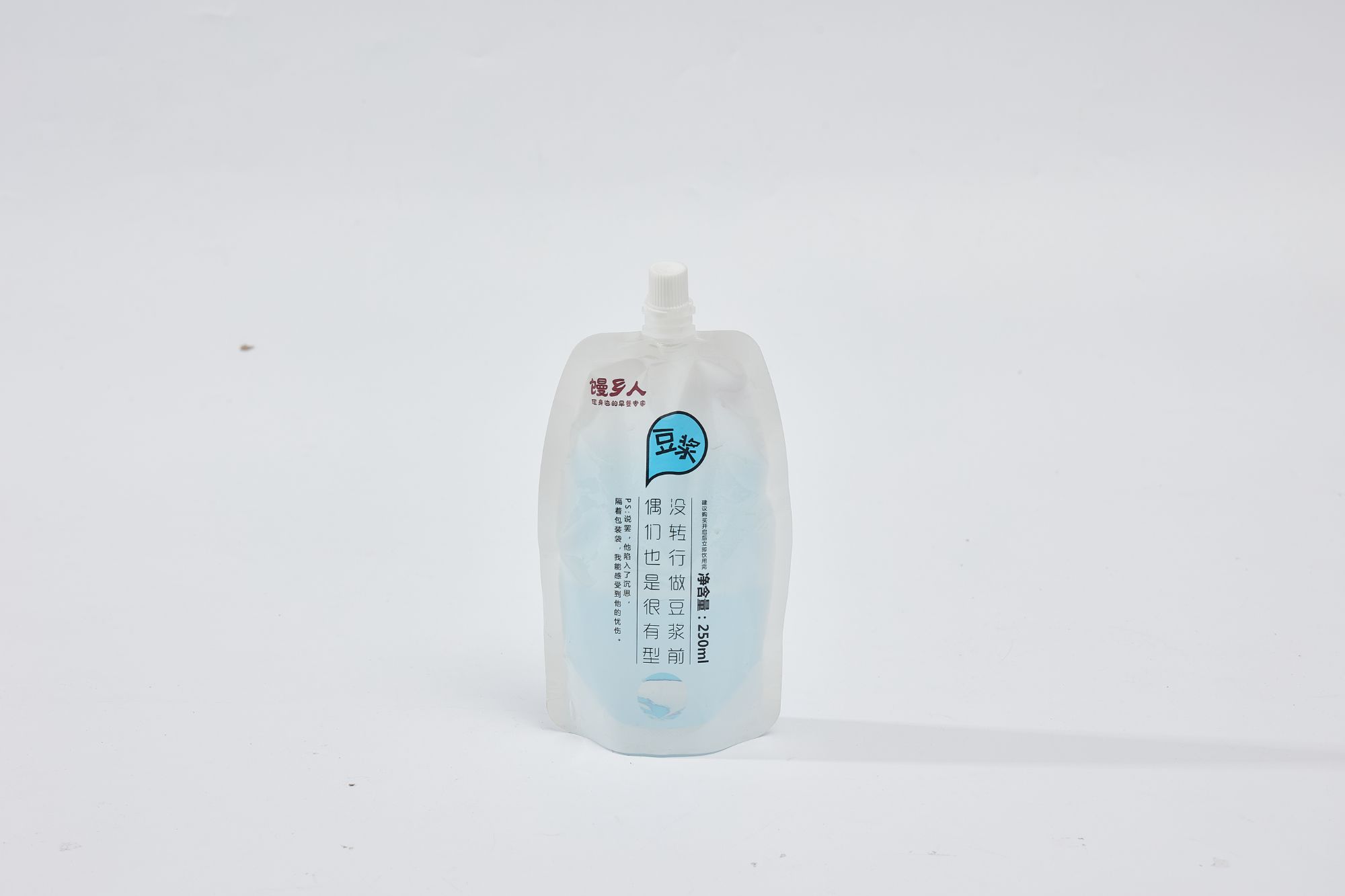 Hot selling glossy leakproof soybean milk packaging bag Soap liquid cream sauce standing mouth sucking bag