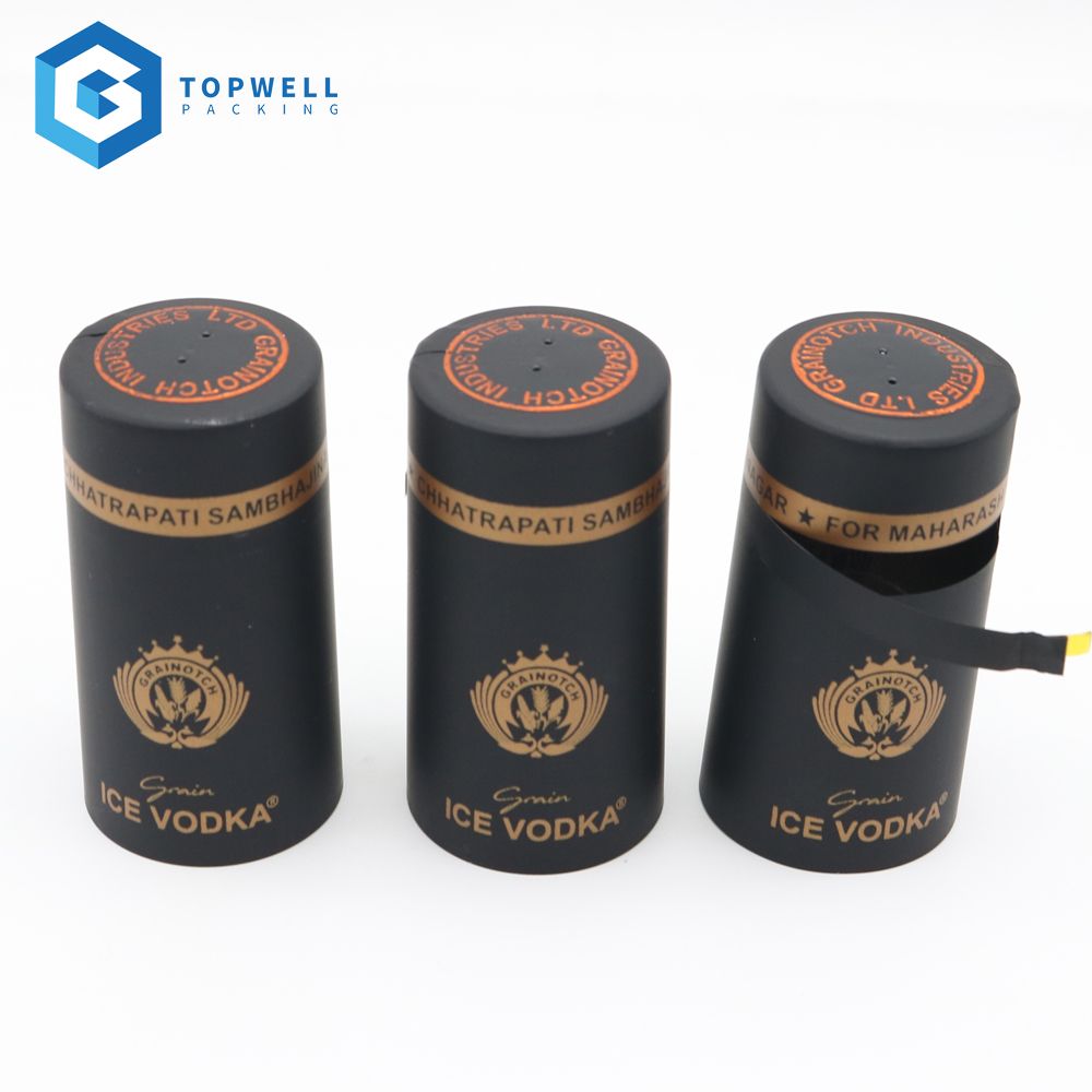 Online Custom Round Emboss Tops Plastic PVC Heat Shrink Caps Seal Capsule For Wine Liquor Bottle