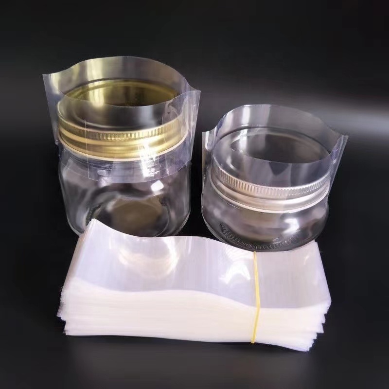 Good Plastic POF PVC PET heat shrink band Transparent perforated shrink Band clear wrap film sleeve band for bottle jars seal