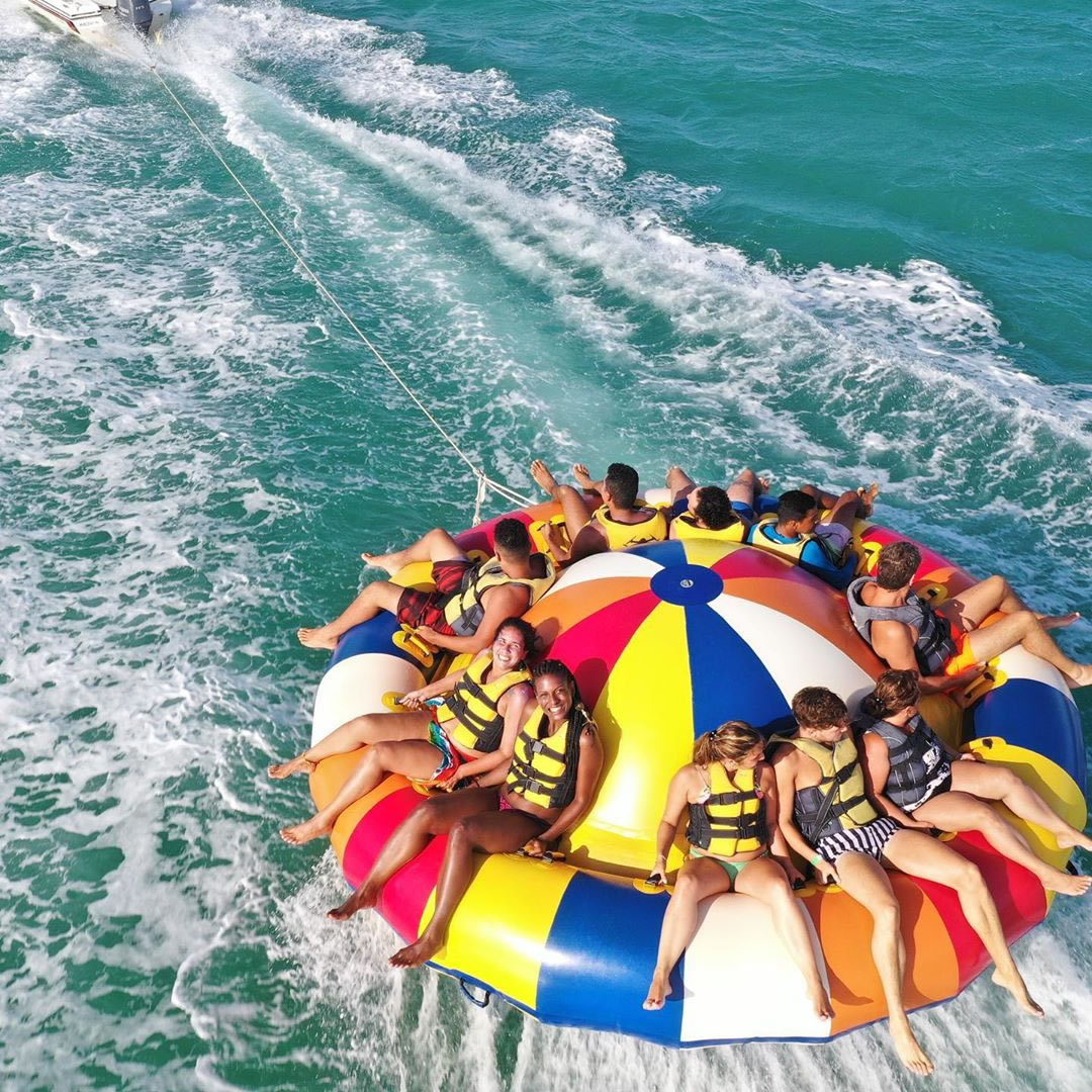 Wholesale 6 Person Water Sport Inflatable Disco Boat Spinning Towable Tube For Sea Lake