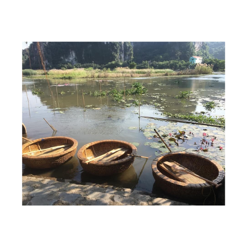 Bamboo coracle basket leisure small boat with paddles and seat tourist tourism resort boats