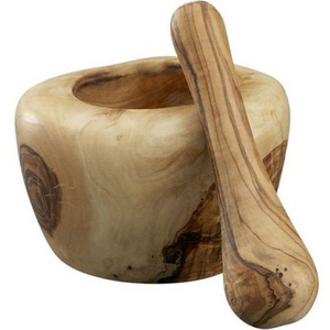 Large wooden mortar and pestle has items of garlic masher bowl, granite mortar and mortar salt.