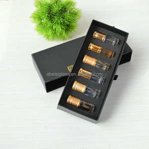 Wholesale Custom Black Attar Oud 3ml 6ml 12ml Glass Stick Octagonal  Empty Essential Oil Bottles Roll On